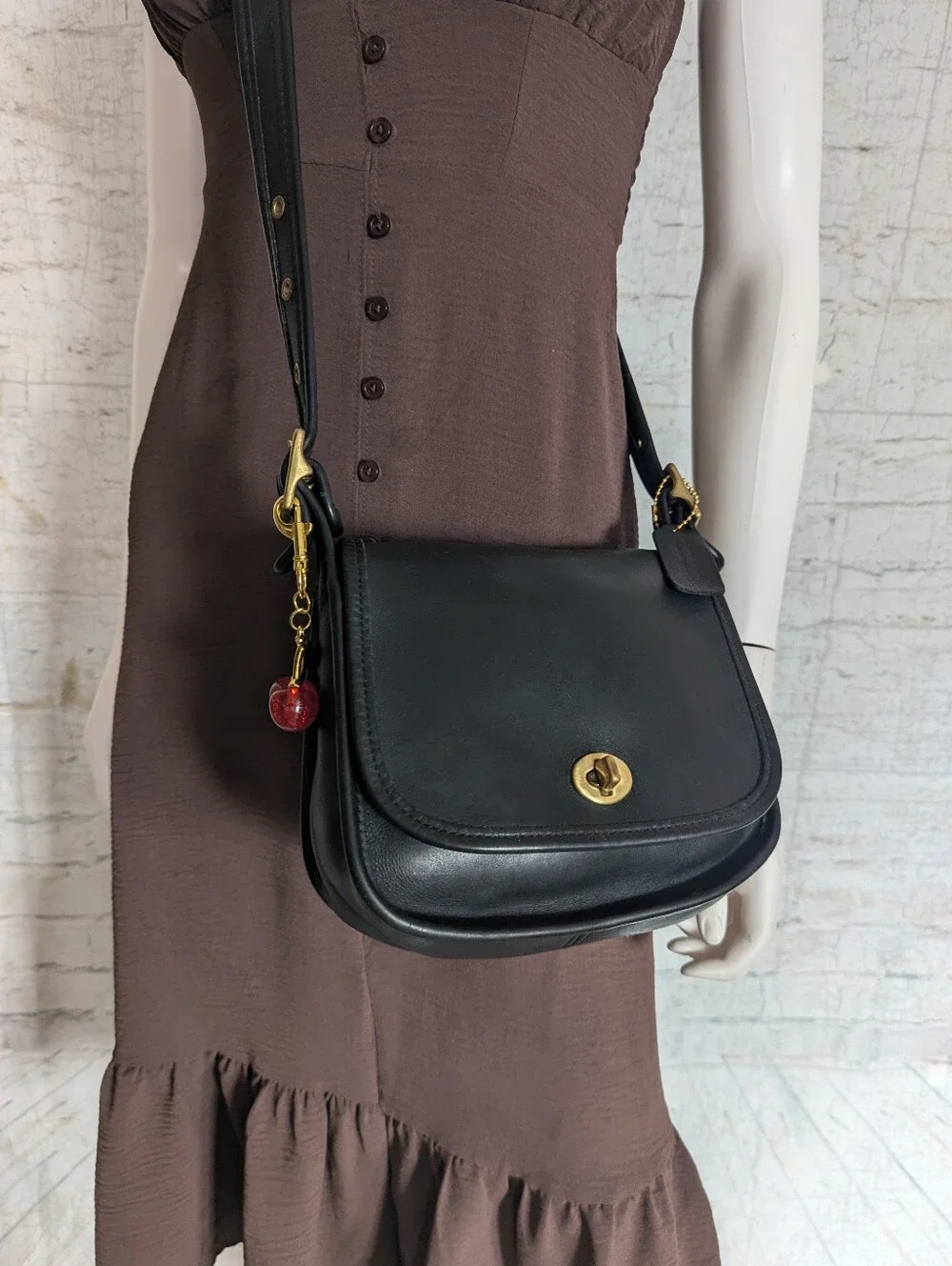 Coach Black Leather Crossbody with Gold Hardware and Cherry Charm